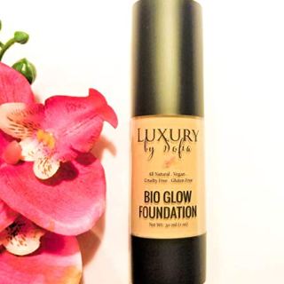 Home Organic Bio Glow Liquid Foundation bottle with honey shade, offering natural, flawless coverage for all skin types.