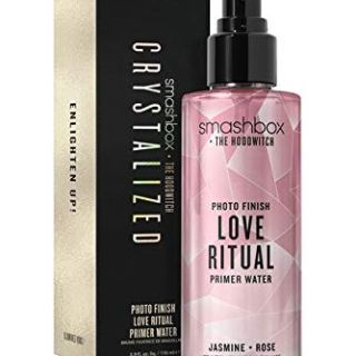 Home Crystal-infused Smashbox Primer Spray with rose quartz, amethyst, and black tourmaline for hydration and radiant skin.